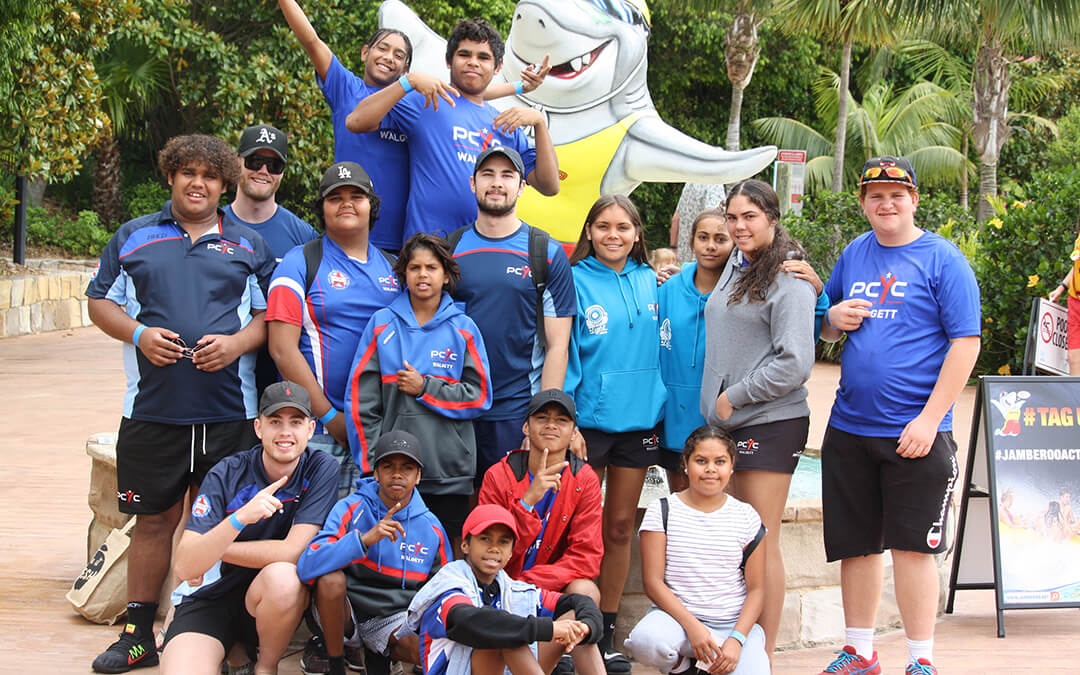 Group of Aboriginal children in colour t-shirts