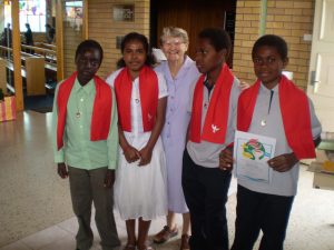 Catholic religious nun with people from PNG