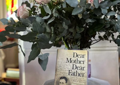 Dear Mother Dear Father Book on table