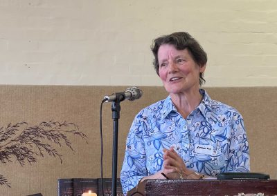 Woman speaking at lectern