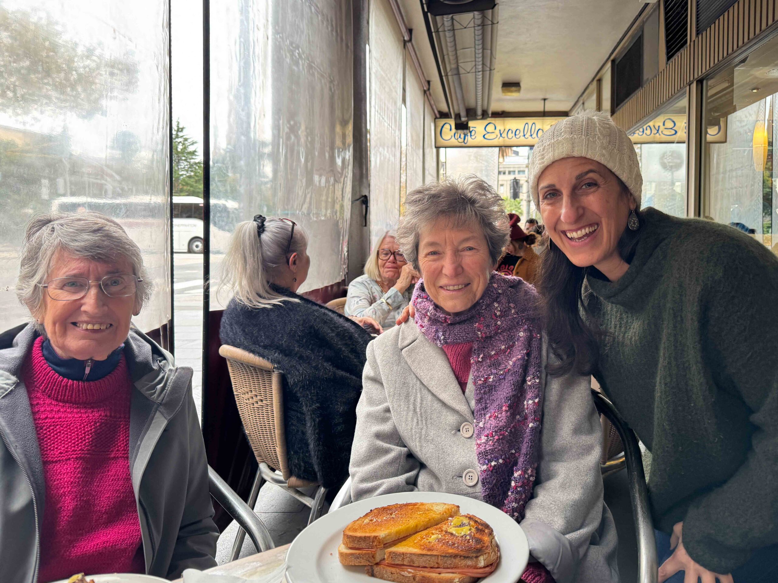 Three women at table at cafe