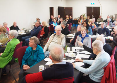 Groups of people at tables