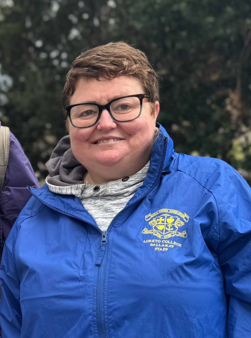 Women standing outside.