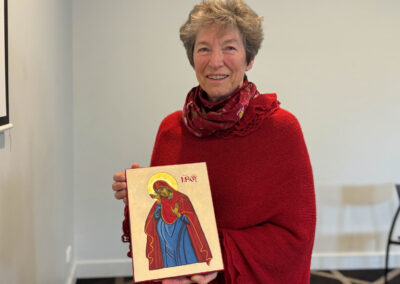 Woman holding icon