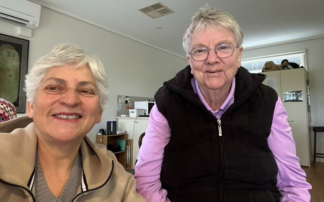 Two women next to each other